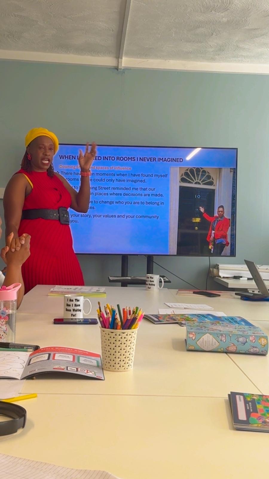 A speaker sharing her experience during an Arise workshop